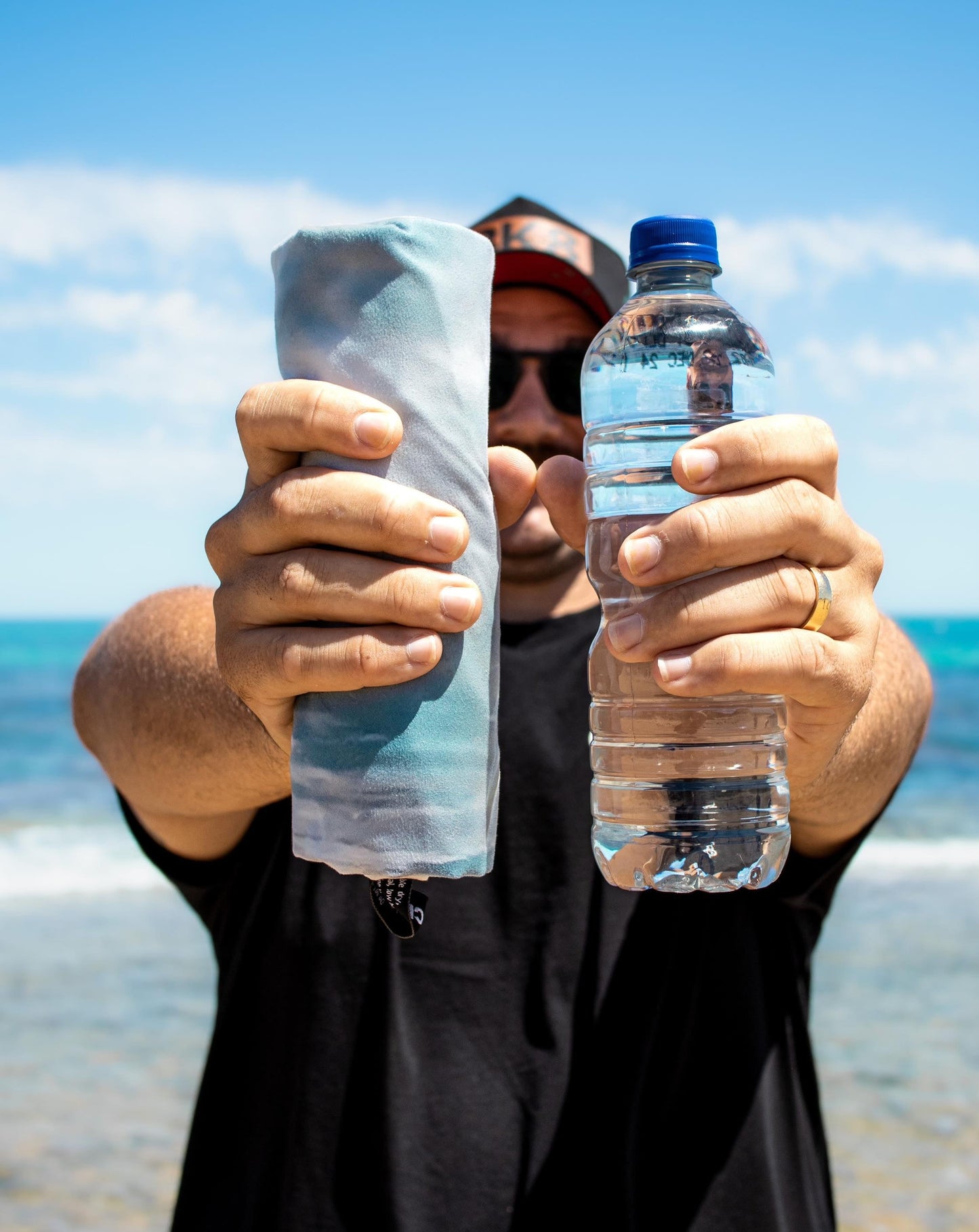 from this to this. example image of a plastic water bottle that has been changed into our recycled plastic adventure towel