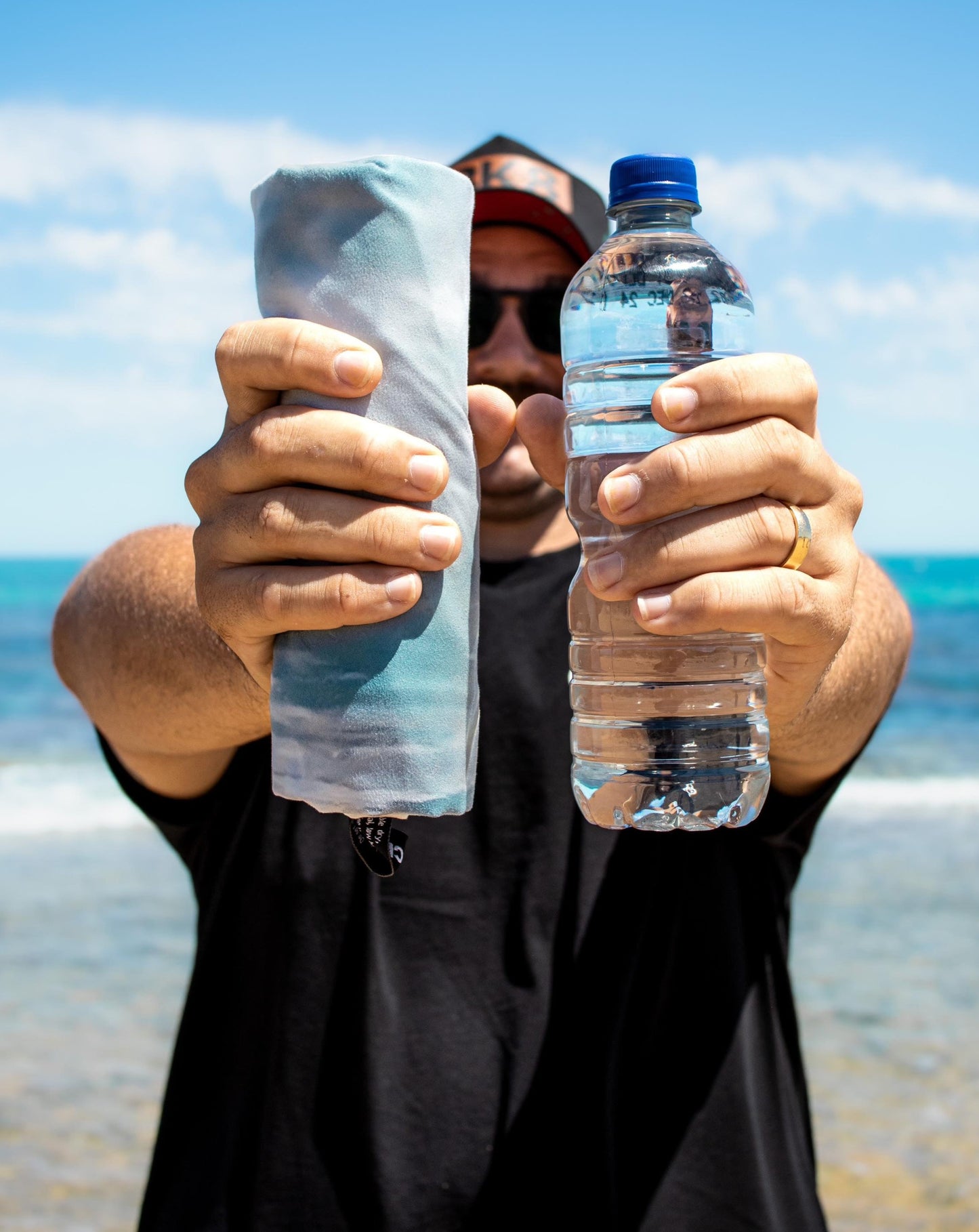 from this to this. example image of a plastic water bottle that has been changed into our recycled plastic adventure towel